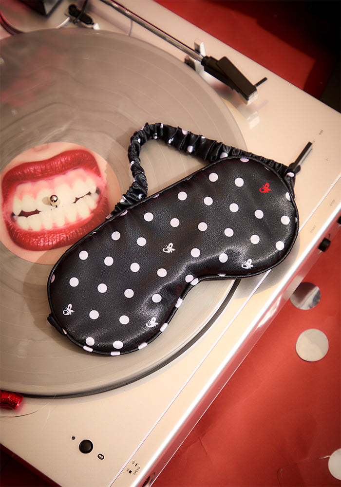black polka dot sleepmask and vinyl