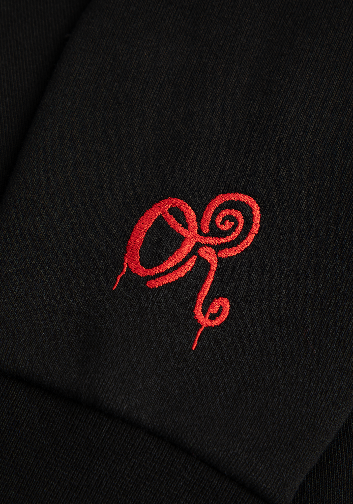 stitch me up embroidered hoodie sleeve detail